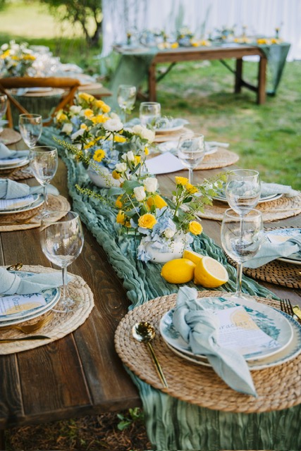 Intimate candlelight dinner with layered place settings